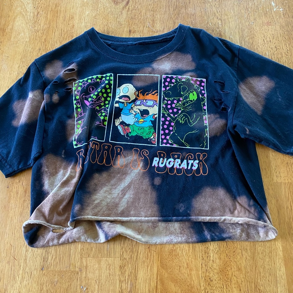 Crop top, design has holes, says Rugrats.